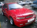 Red Nexia sedan Red Nexia sedan